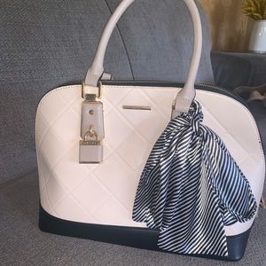 Mid size never been worn bag by Aldo